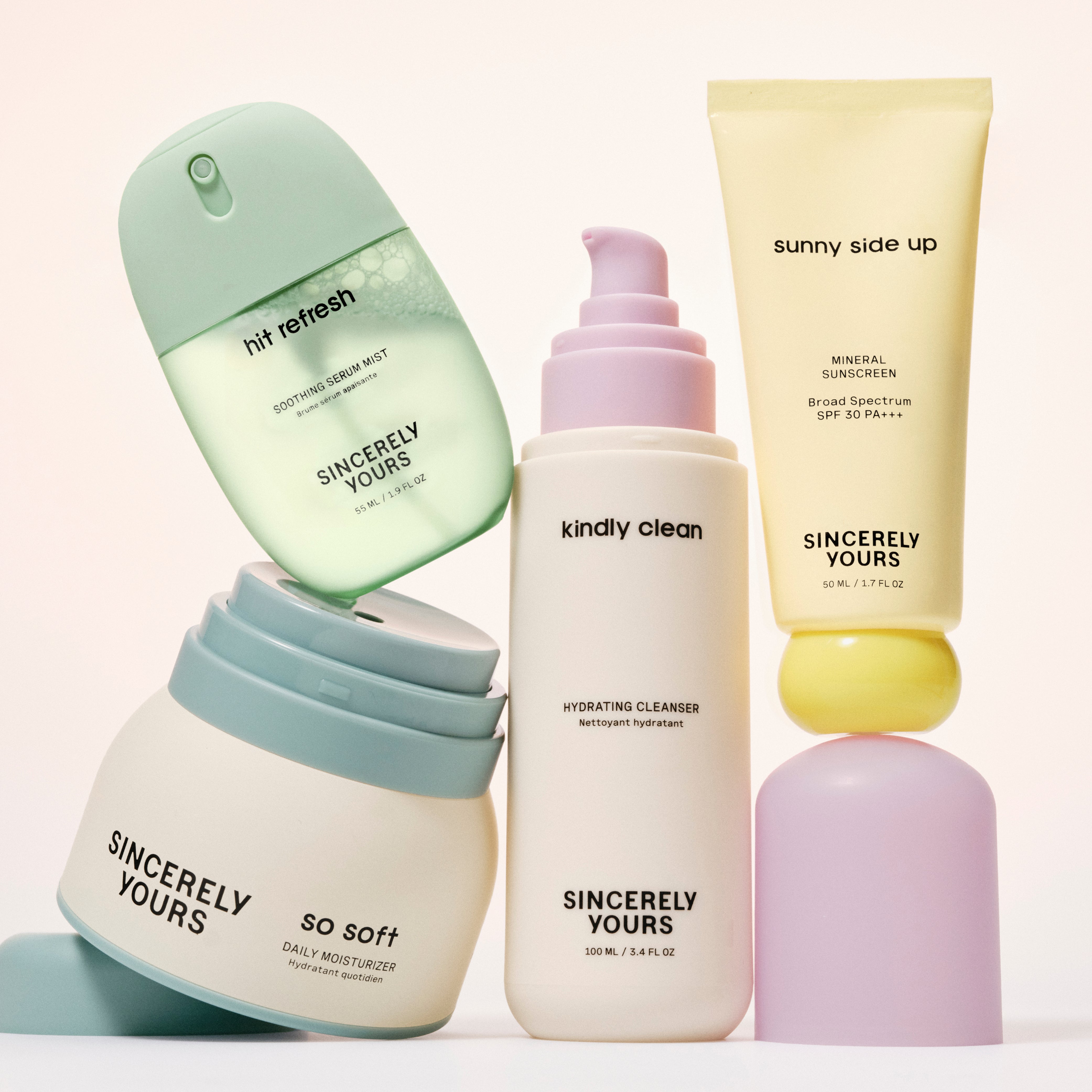 Collection of skincare products with 'Sincerely Yours' branding on a light background