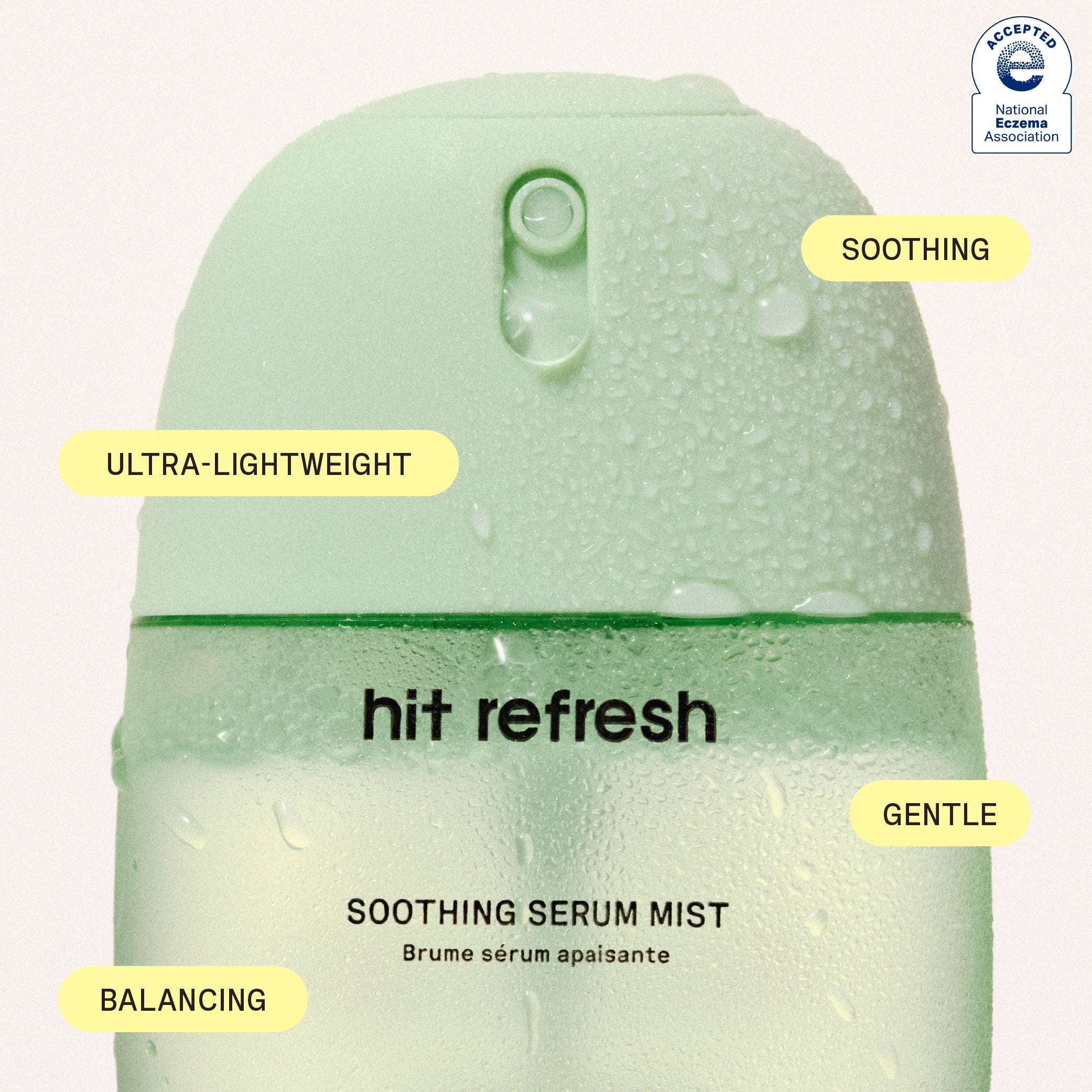Green serum mist bottle labeled 'hit refresh' with features like ultra-lightweight, soothing, and gentle on a white background.