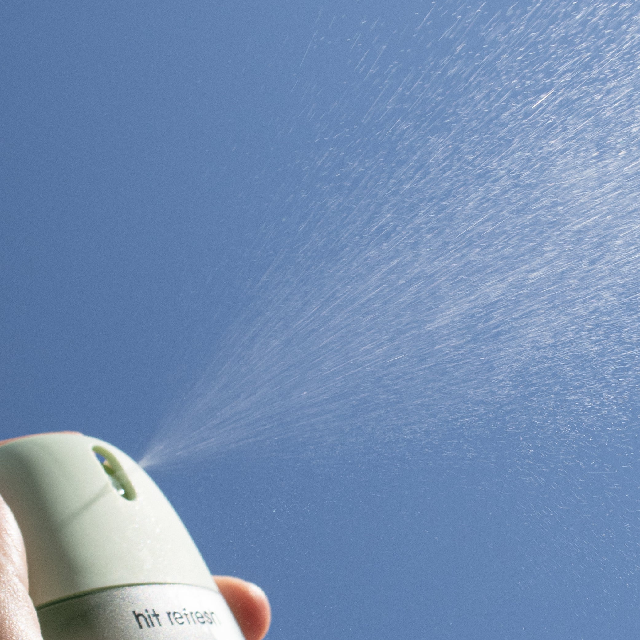 Hit Refresh Serum Mist Action Shot