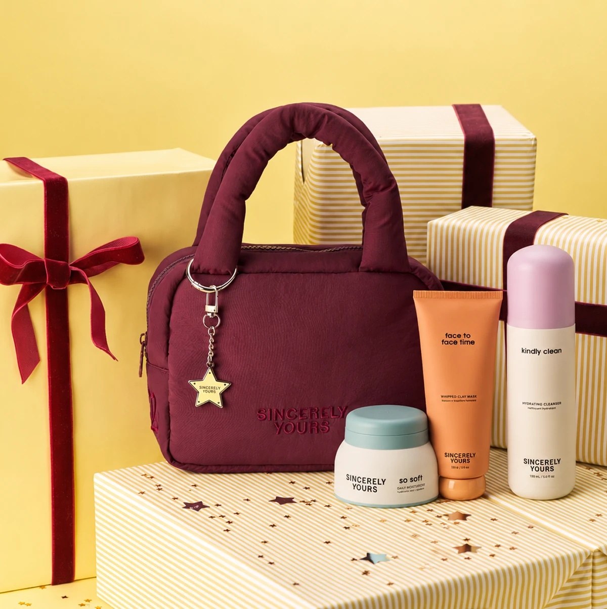 The Winter Re-Set with the cranberry bag, wrapped gifts and star confetti